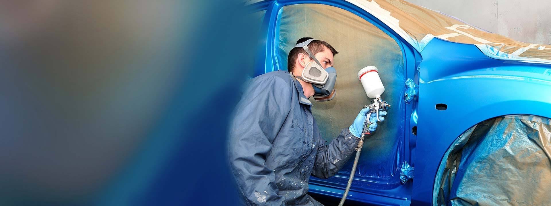 Precision paint work on a blue vehicle